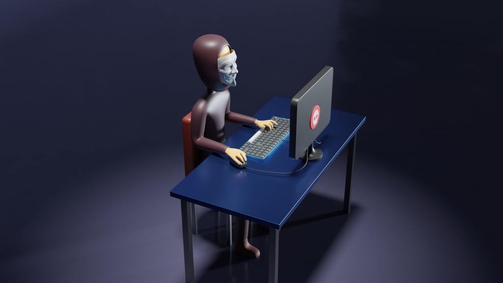 Imagen de persona anónima en su computador. Señales de una estafa: cómo saber que te engañan.