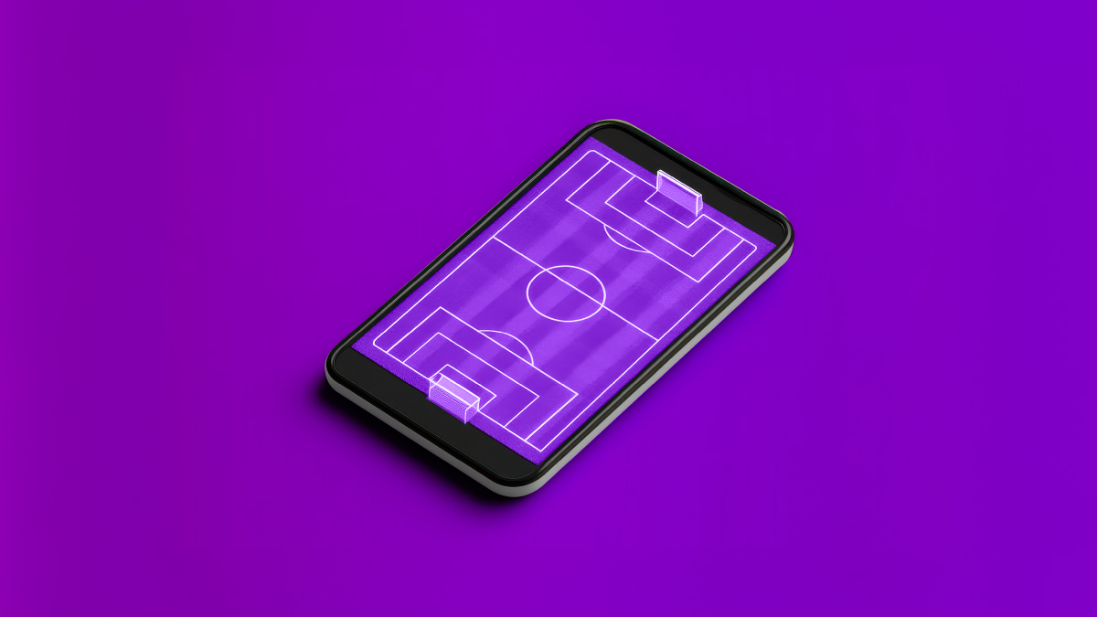 Ilustración de celular y cancha de fútbol en pantalla ¿Cuánto cuesta ir al Mundial de fútbol 2026?